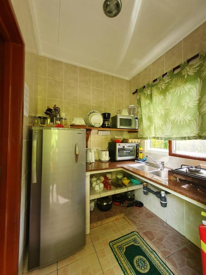 Pension Hibiscus Диг Екстериор снимка