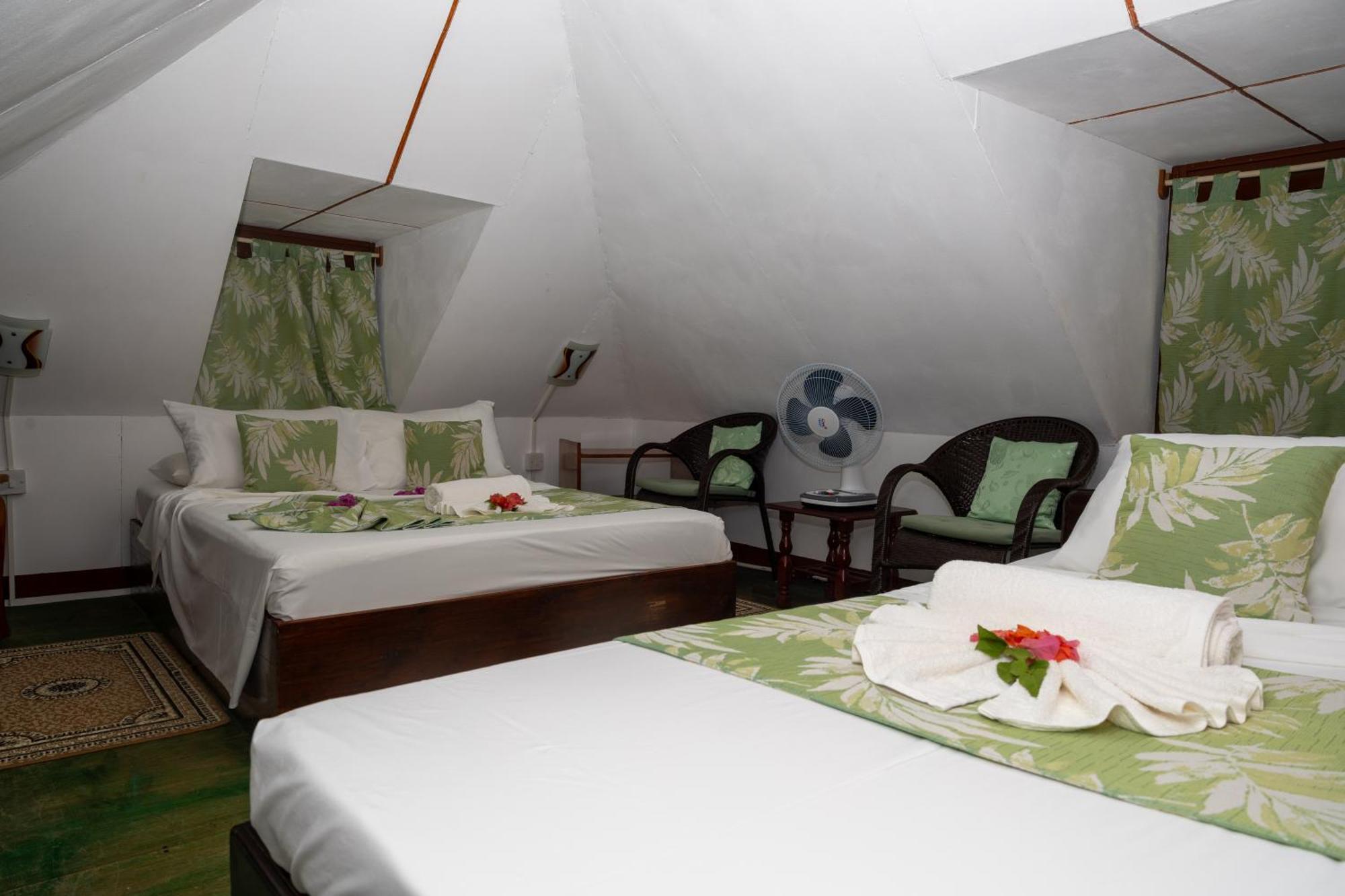 Pension Hibiscus Диг Екстериор снимка