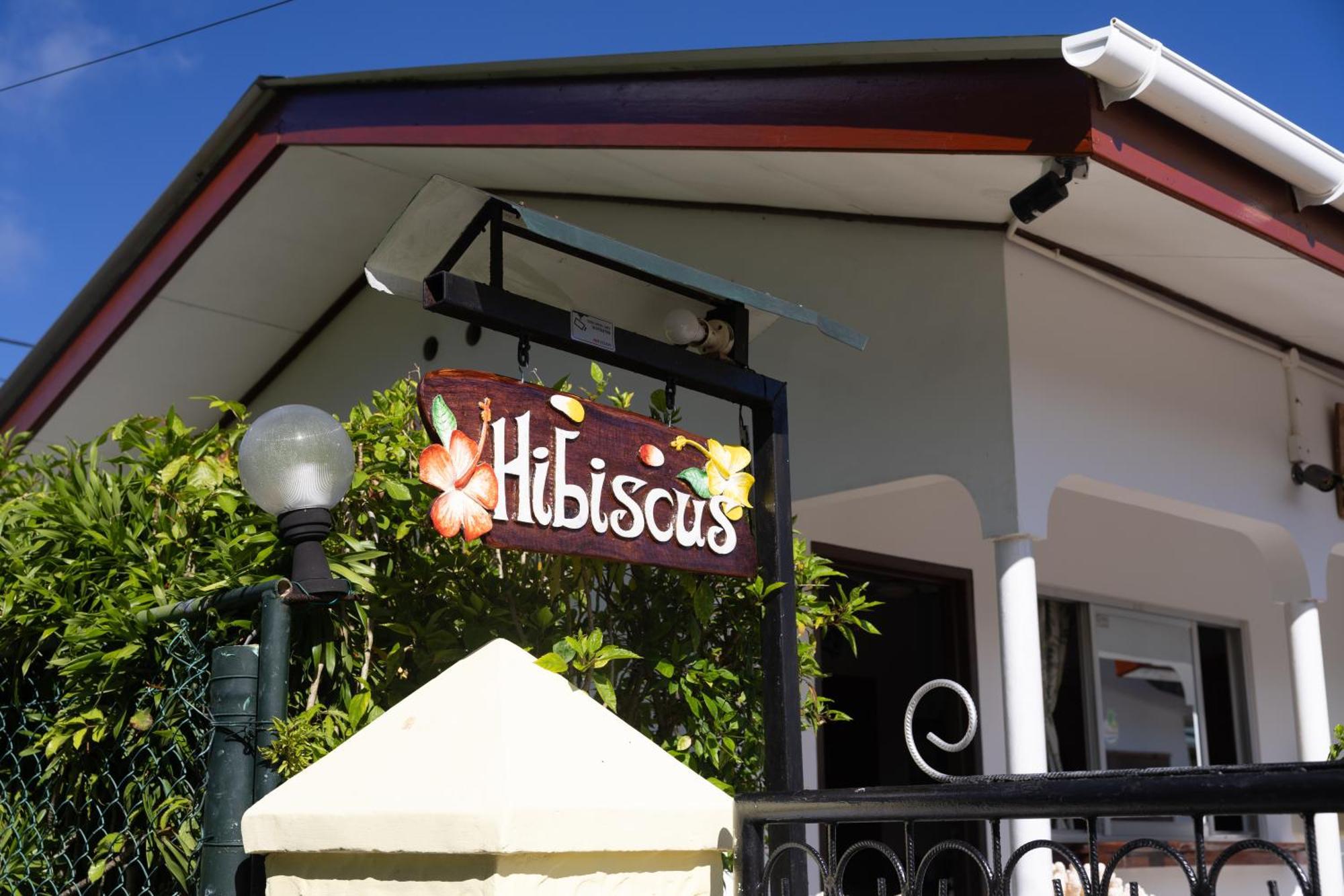 Pension Hibiscus Диг Екстериор снимка